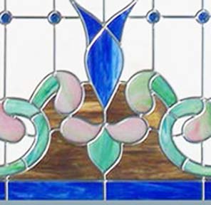Victorian style stained and leaded glass window closeup