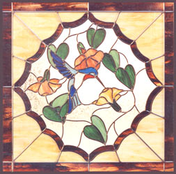 stained glass hummingbird with fuchsia flowers