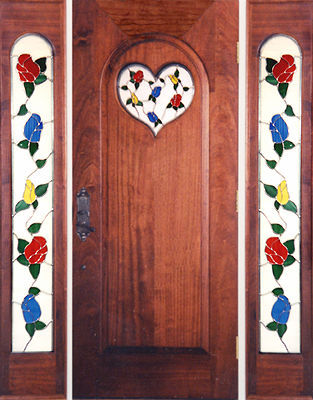 Entry with rosebud stained and leaded glass windows