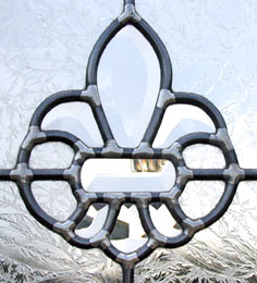 Fleur de Lis stained and leaded glass window