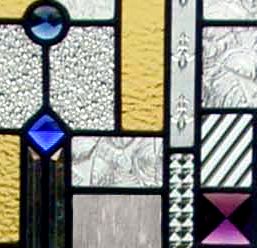 Closeup of Frank Lloyd Wright inspired custom stained and leaded glass window