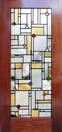 Mahogany door with leaded glass window inspired by the works of Frank Lloyd Wright
