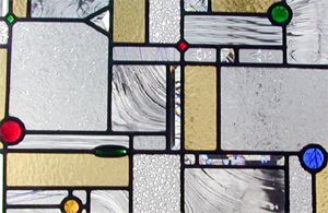 Closeup of Frank Lloyd Wright inspired custom stained and leaded glass window