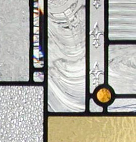 Closeup of Frank Lloyd Wright inspired custom stained and leaded glass window