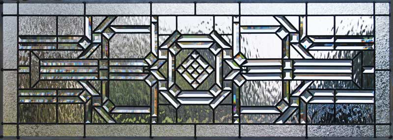 Custom leaded glass abstract pencil bevels transom window