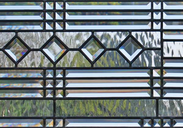 Closeup of custom abstract leaded glass pencil bevel window